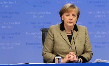 Меркель призвала Путина способствовать выборам в Украине