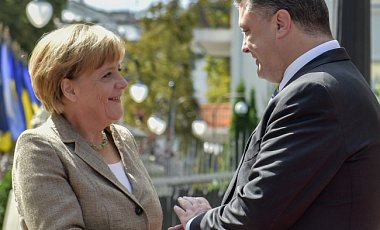 Меркель не признает аннексии Крыма, но  и не обещает военную помощь