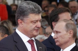 Порошенко и Путин договорились о "постоянном прекращении огня"
