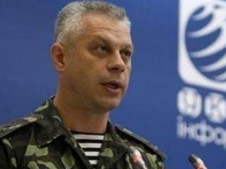 В Луганске вооруженные террористы разогнали людей и похитили гуманитарную помощь - СНБО