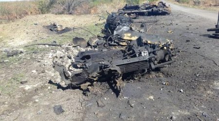 Останки украинских военнослужащих на Донбассе и подбитая техника. Фото Останки украинских военнослужащих на Донбассе и подбитая техника. Фото