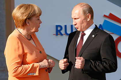 "Гомофобная" кошка пробежала между Путиным и Меркель "Гомофобная" кошка пробежала между Путиным и Меркель