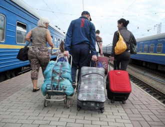 ООН намерена расширить помощь переселенцам в Украине в январе 2015 года