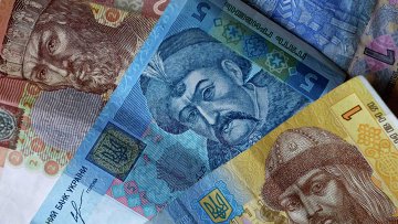 Захарченко: рубль и доллар заняли треть валютного рынка ДНР