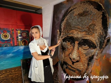Портрет Путина из патронов и крестный ход в Киеве: фото дня