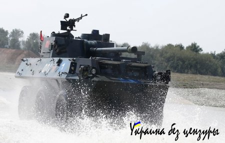 Обстрелянный Донецк и армейские игры в России: фото дня
