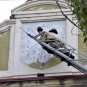 Жители Донецка завершают демонтаж символики Украины со зданий города (ФОТО)