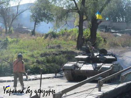 Украина начала отвод техники от линии соприкосновения сторон на Донбассе (ФОТО)