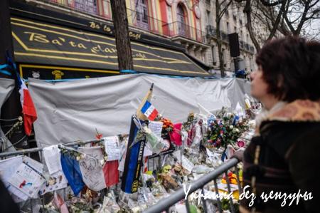 В Париже месяц спустя почтили жертв терактов